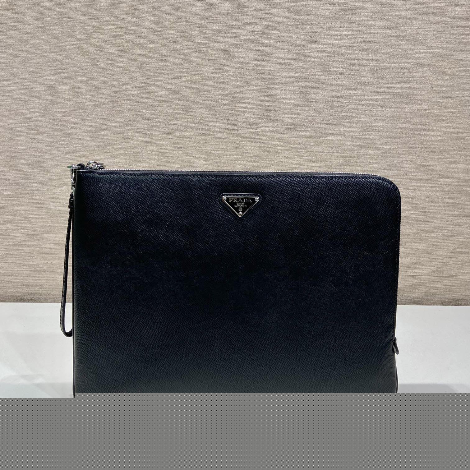 Pra*a clutch bags